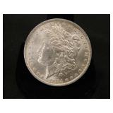 1884-O Morgan Silver Dollar;