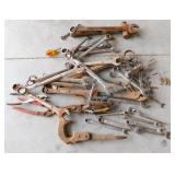 bucket of wrenches and tools