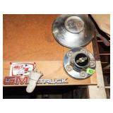 2-HUBCAPS AND TAG LIGHT PONTIAC AND CHEVY