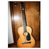 Acoustic Guitar; Needs stringing; Has some damage