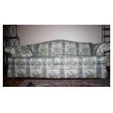 Floral Couch with pull out bed and 2 Throw pillows
