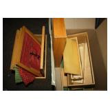 Wooden boxes (empty); frames with material inside