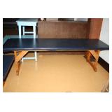 Wooden table covered in vinyl