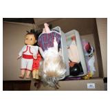 Several Dolls and Clothing for Dolls