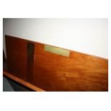 Solid swinging doors with brass like kick plates