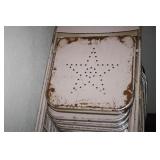 Metal folding chairs on rolling rack