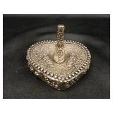 Ring holder; Silver tone w/raised design;