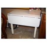 White Wooden Drop leaf table-on castors