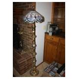 Stained Glass style lamp shade on gold floor lamp