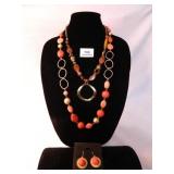 Pink/Red Beaded Necklace; Brass tone beaded chain