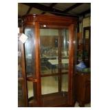 Display Case with rounded sides(has glass shelves