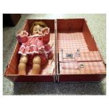 Large Doll in Trunk