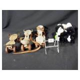 Vintage Roller Skates (3), Plush Skunks (2)