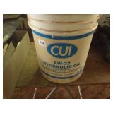 Buckets Hydraulic fluid, one full, one half full