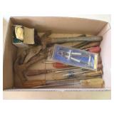 Screwdrivers, Large pliers, hammer, compass,