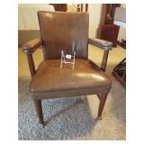 Wood Chair on casters, probably leather