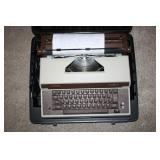 Electronic Typewriter in Plastic Case; Power on