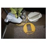 Plastic food storage items under table