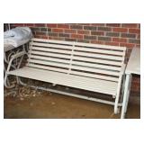 Glider and Items in front porch/walkway