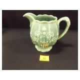 Pitcher w/raised detail; flowers on handle; 6¼" h Pitcher w/raised detail; flowers on handle; 6¼" h