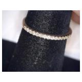 Small silver-tone ring with clear stones