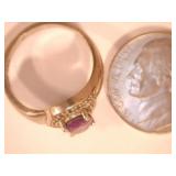 Womens silver color ring w/purple stone