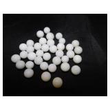 37 vintage white marbles