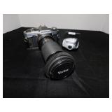 Olympus camera with Tamron extra lens. See desc