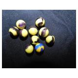 9 vintage black/yellow & 1 blue/yellow marbles