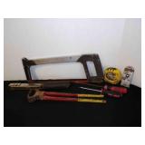 various tools hand saw, iron tong, stapler, etc.