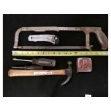 various tools hammer, hand saw, Phillips, etc.