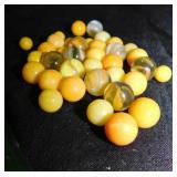 36 vintage assorted variety yellow marbles