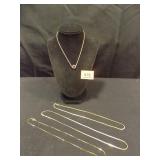 Gold Necklaces, one with Purple Pendant