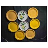 6 yellow saucers, 6 5/8" diam; 2 flowered saucers