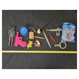 Various toys; Water pistol, yo-yo, train whistle