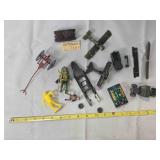Assortment of various toy set parts