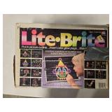 Lite-Brite toy; Insert colored pegs in pattern