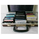 Vintage brown leatherette case w/cassette tapes