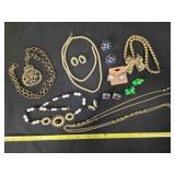 5 necklaces; 6 earrings, 4 clasps, 2 pierced