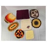 8 hot pads & potholders, most crocheted