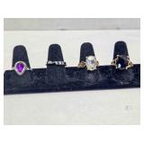 4 size 8½ ladies rings; Purple teardrop