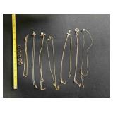8 gold-tone necklaces; Hearts & crosses