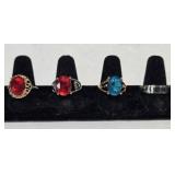 4 size 9 ladies rings; Blue oval; Spinner