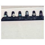 6 silver tone rings; Size 7; 3 turquoise