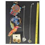 2 necklaces, 3 keyrings, clip-on earrings
