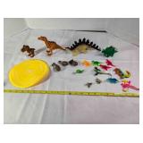 Toy dinosaurs & frisbee