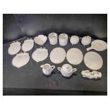 Unpainted porcelain; 2 oval wall hangings (6½")