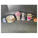 Hand painted porcelain: 13 plates, 2 pitchers