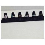 6 size 7½ ladies rings; Purple stone