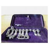 White Sewing Machine Parts in metal box
